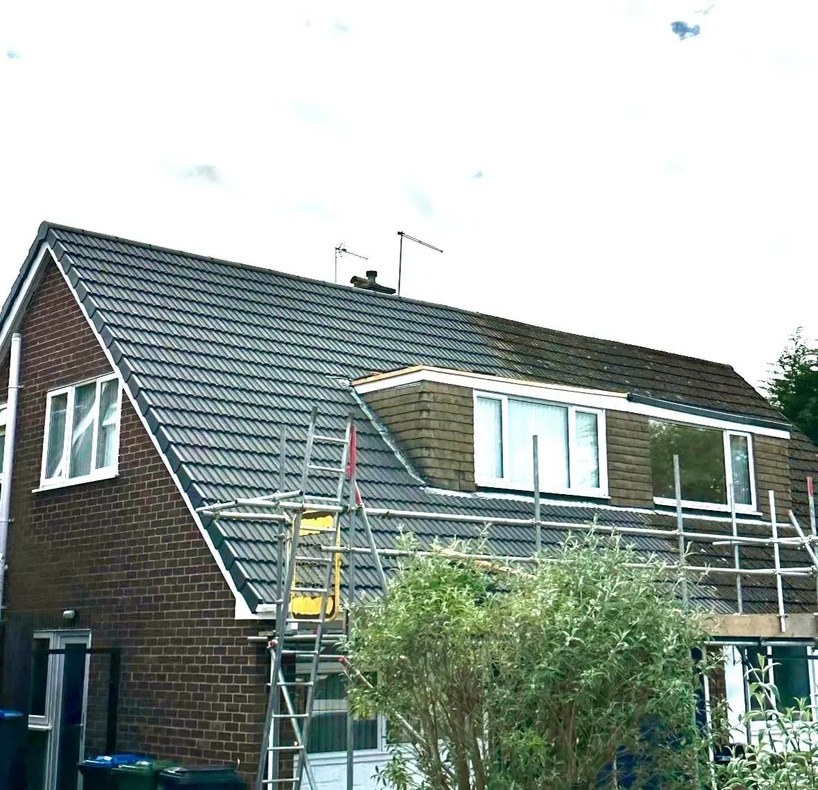 Completed re-roof on a semi-detached house with dormer