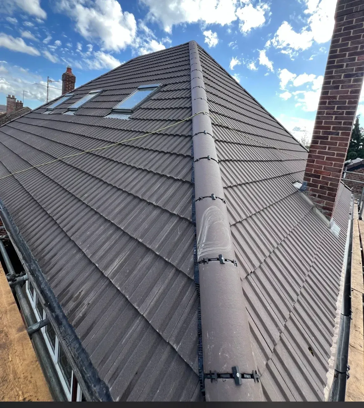 New tiled roof with skylight windows fitted by Coventry Roofing Group