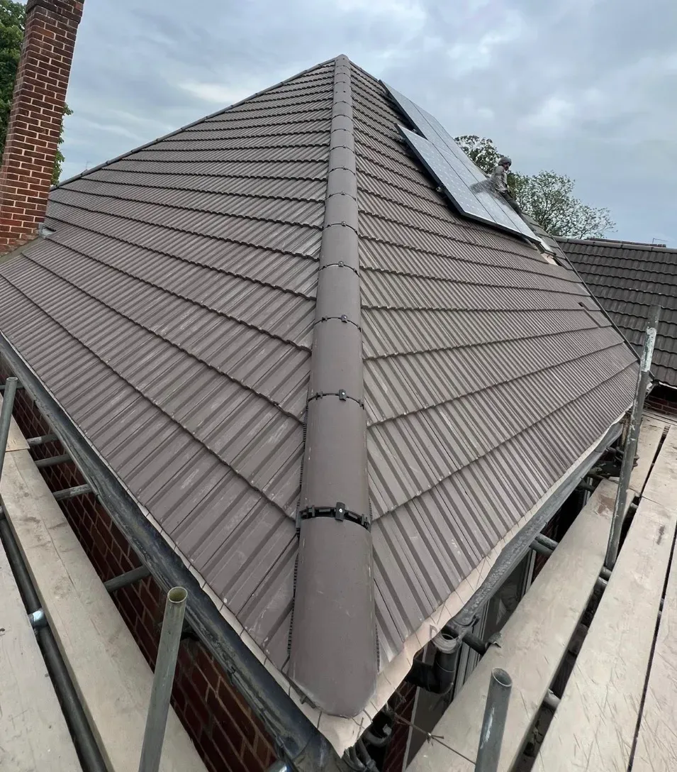 Tiled roof with solar panels on a Coventry property
